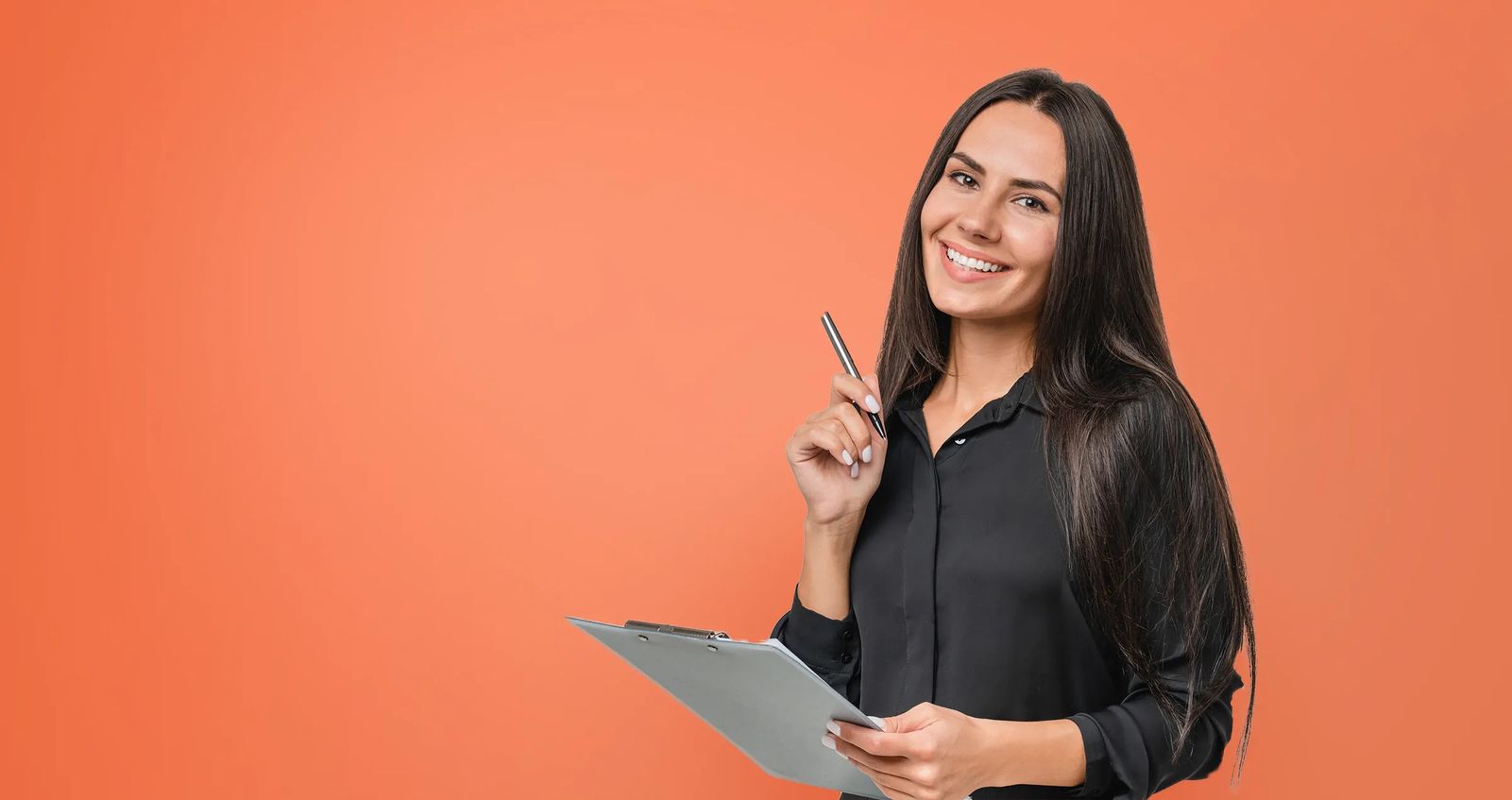 Guide to Starting a New Business. Photo of business woman holding clipboard and pen.