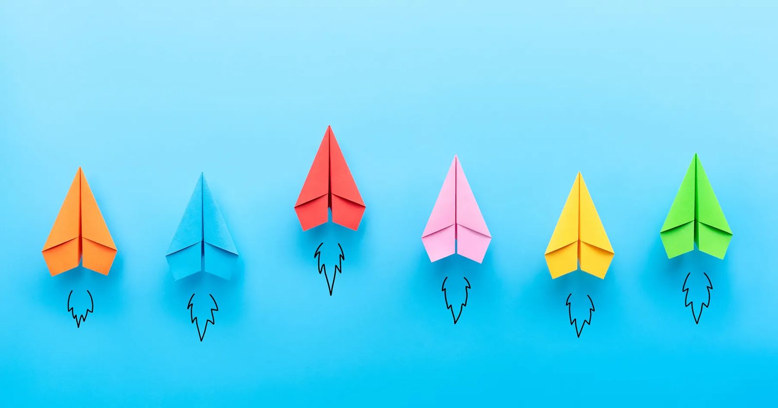 paper airplanes symbolizing launching your website